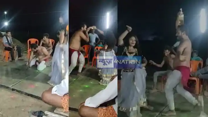 Motihari Drunkard waving bottle with bar girls Motihari Drunkard waving bottle with bar girls