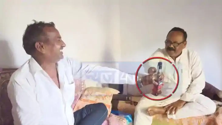 jdu state secretary viral photo with liquor bottle