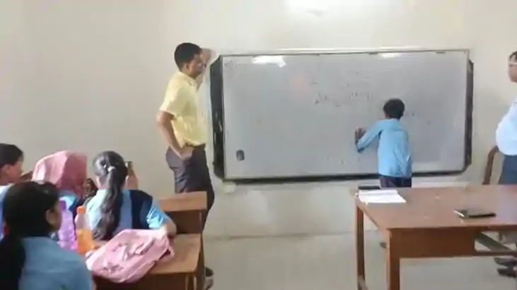 Katihar DM Turns Teacher Teaches Students in Classroom