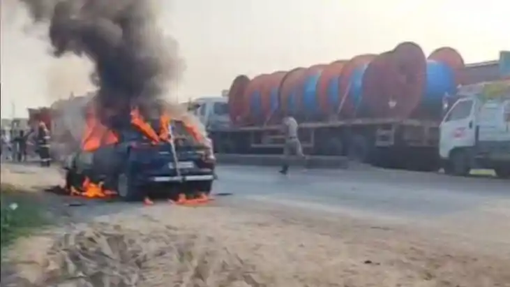 Fire in moving car Fire in moving car