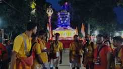 13 Kanwariyas Carry Giant Shiva Lingam Replica to Deoghar