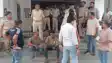 excise department arrests liquor smuggler with beer suitcases