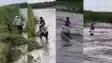 Helpless father carries son on his shoulders across a swollen river