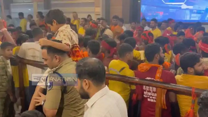 City SP Carries Child on Shoulder for Baba Garibnath Darshan