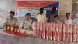 शराब कारोबारी के घर छापेमारी करने गई पुलिस टीम पर तलवार से हमला, भारी मात्रा में विदेशी शराब के साथ पिता-पुत्र गिरफ्तार
