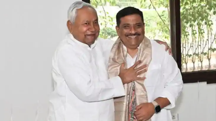 Nitish Kumar - Sanjay Jha 