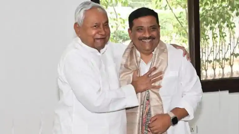 Nitish Kumar - Sanjay Jha 