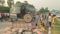 Bus Rams Tractor Four Workers Hurt Cement Bags Spill on Road