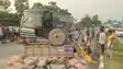 Bus Rams Tractor Four Workers Hurt Cement Bags Spill on Road