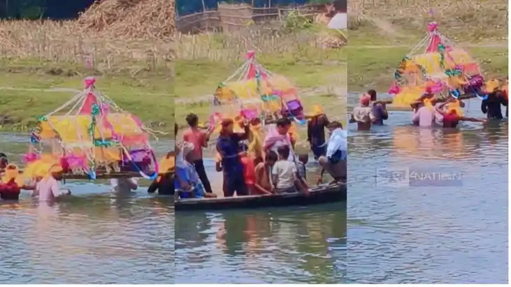 No Bridge Even in Death Villagers Carry Bier Across River